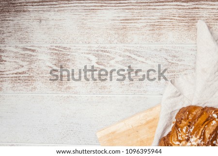 Similar – Image, Stock Photo rustic bread, wrapped in striped fabric