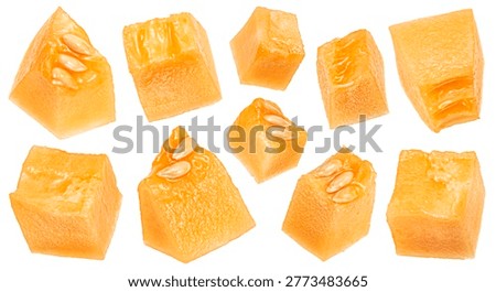 Sweet melon pulp cubes isolated on white background with clipping path