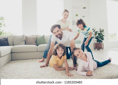 Sweet Moments, Relax, Rest, Chill, Careless, Carefree, Dream, Dreamy, Leisure, Lifestyle Concept. Tutor, Volunteer, Teacher On Kindergarten Play With Kids Near Couch Carpet Light Bright Living Room