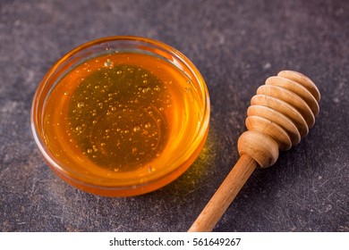 Sweet Natural Honey In Glass Jar On Table Top View
