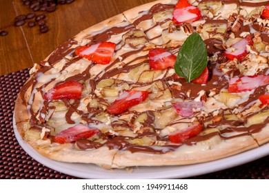 
Sweet Nutella Pizza With Banana And Strawberry