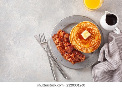 sweet pancakes with butter and bacon. traditional american breakfast