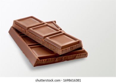 Sweet pieces of tasty milk chocolate - Shutterstock ID 1698616381
