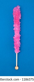 Sweet Pink Rock Candy On A Blue Background