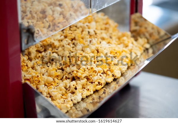 Sweet\
popcorn in a popcorn machine shop. Selected\
focus,