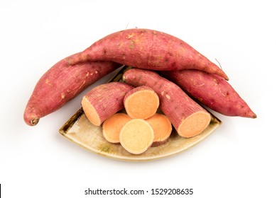 Sweet potato fruits on a white background.
