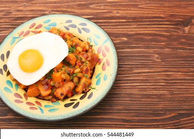 Sweet Potato Hash With Fresh Herbs, Peppers And Onions. Healthy Eating Concept. Nutritious Breakfast.