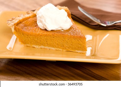 Sweet Potato Pie With A Dollop Of Freshly Whipped Cream