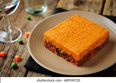 Sweet Potato Shepherd's Pie On A Wood Background. Toning. Selective Focus