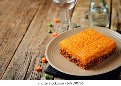 Sweet Potato Shepherd's Pie On A Wood Background. Toning. Selective Focus