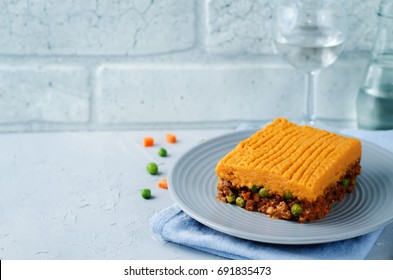 Sweet Potato Shepherd's Pie On A Grey Background. Toning. Selective Focus