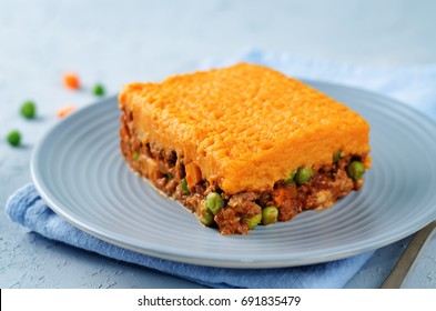 Sweet Potato Shepherd's Pie On A Grey Background. Toning. Selective Focus