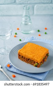 Sweet Potato Shepherd's Pie On A Grey Background. Toning. Selective Focus