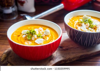 Sweet Potato Soup With Carrot, Pumpkin, Shrimps, Feta Cheese, Parsley And Red Pepper