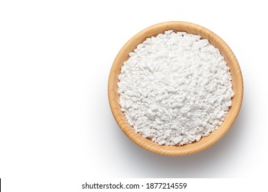 Sweet potato starch in a wooden bowl isolated on white background. Top view.
