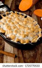 Sweet Potatoes Or Candied Yams. Classic American Thanksgiving Side Dish. Served With Toasted Marshmallows, Cheese, Garnished With Scallions And Italian Parsley And Served In Cast Iron Skillet. 