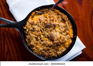 Sweet Potatoes Or Candied Yams. Classic American Thanksgiving Side Dish. Served With Toasted Marshmallows, Cheese, Garnished With Scallions And Italian Parsley And Served In Cast Iron Skillet. 