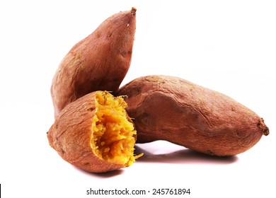 Sweet potatoes. Cooked whole and halved sweet potatoes.