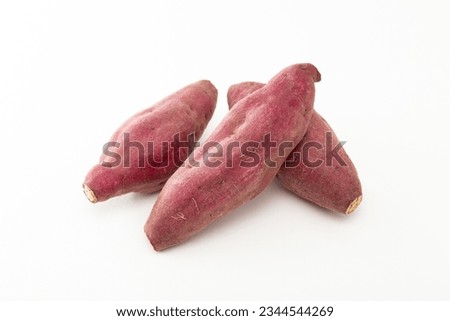 Sweet potatoes on white background.