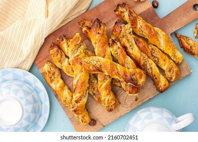 Sweet puff pastry rolls swirls with walnuts and sugar - Shutterstock ID 2160702451