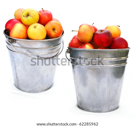 sweet red apples in basket isolated on white background