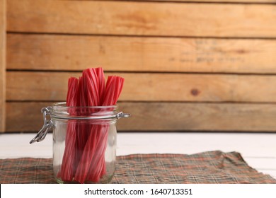 sweet red gummy licorice in color background