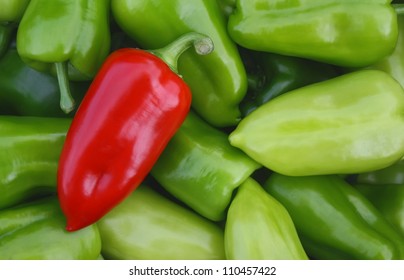 Sweet Red Pepper Against Green Pepper