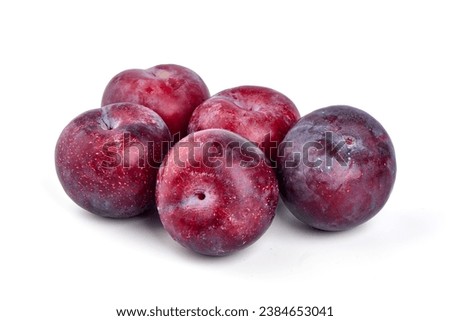Sweet red plums, isolated on white background