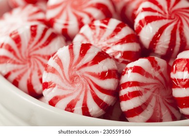 Sweet Red And White Peppermint Candy In A Bowl