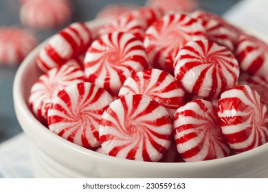 Sweet Red And White Peppermint Candy In A Bowl