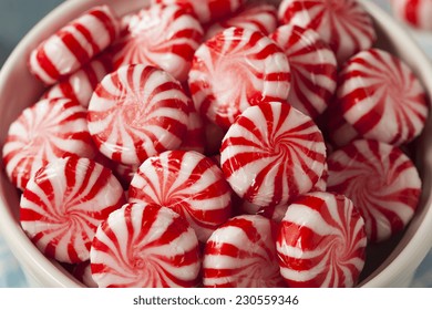 Sweet Red And White Peppermint Candy In A Bowl