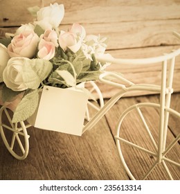 sweet roses soft color on wooden, vintage style background - Shutterstock ID 235613314