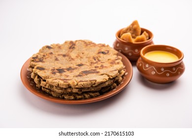 Sweet roti made out of rice flour, jaggery, and ghee. Gud ki roti. gur ki roti, jaggery Bhakri, meethi gud ki roti. Winter food. Copy space.
