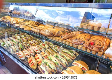 Sweet And Savory Take Away Street Food Display At Plaza De La Reina In Valencia, Spain