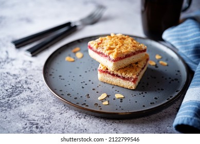 Sweet shortbread cookies with berry jam in a plate. toning. selective focus