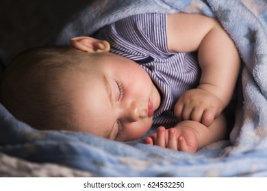 Sweet Sleeping Baby In Warm Night Lamp Light