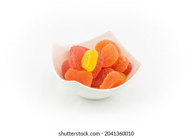 Sweet And Sour Candy In White Bowl Isolated On White Background