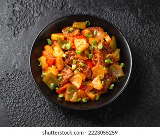 Sweet and Sour Pork with bell pepper, pineapple, spring onion
