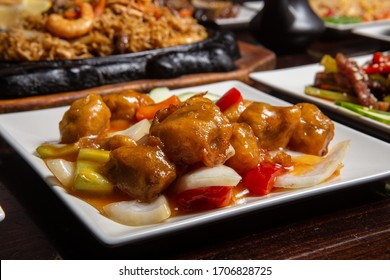 Sweet And Sour Pork Chinese Food. Deep Fried Meat Is Added To Stir Fried Pineapple, Onions, Peppers And Sauce. Sweet And Sour Dishes Are Common In Asian Cuisine, Especially American Chinese Food