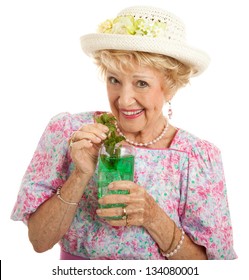 Sweet Southern Lady Drinking A Mint Julep For The Kentucky Derby.  Isolated On White.