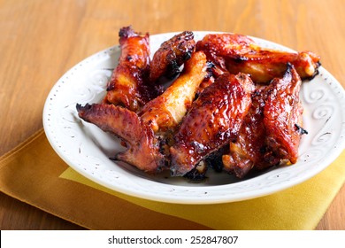 Sweet And Sticky Chicken Wings In A Bowl