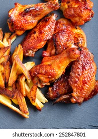 Sweet And Sticky Chicken Wings With Chips