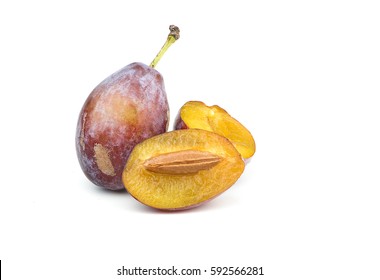 Sweet Sugar Plum Cut In Half On White Background