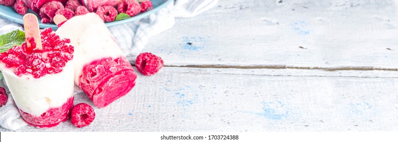 Sweet And Tasty Diet Summer Dessert. Homemade Raspberry Yogurt Popsicle With Fresh Raspberries And Mint. Healthy Ice Cream Recipe. Wooden White Background Copy Space