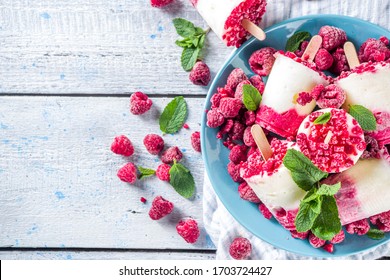 Sweet And Tasty Diet Summer Dessert. Homemade Raspberry Yogurt Popsicle With Fresh Raspberries And Mint. Healthy Ice Cream Recipe. Wooden White Background Copy Space