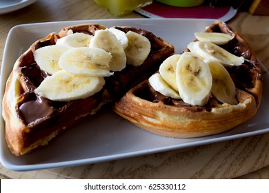 Sweet Waffles With Nutella Cream And Banana Slices