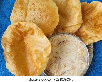 Sweet Wheat Vermicelli Kheer With Wheat Puris