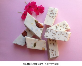 Sweet white halva with nuts - Shutterstock ID 1419697085