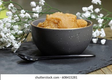 Sweet Whole Wheat Halwa Or Porridge On A Dark Background, Selective Focus.