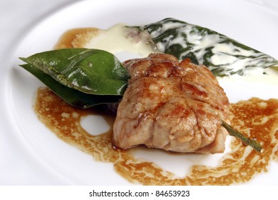 Sweetbreads pricked with bay leaves, stuffed cos leaves